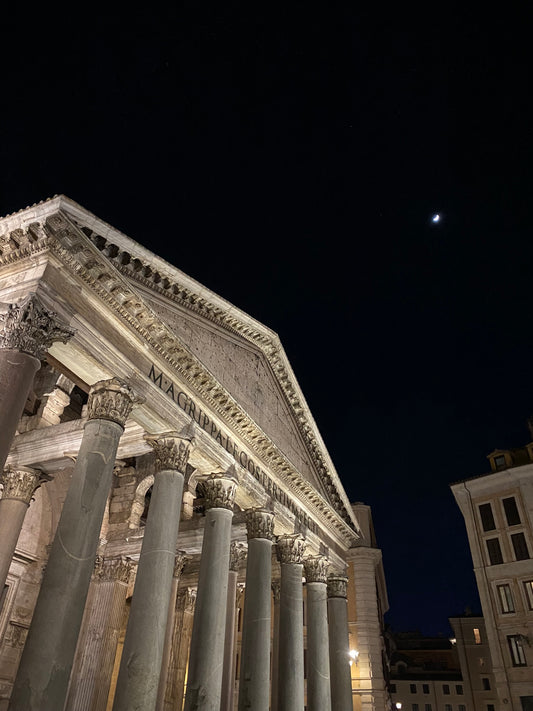 Iconic Pantheon with a sliver of a moon